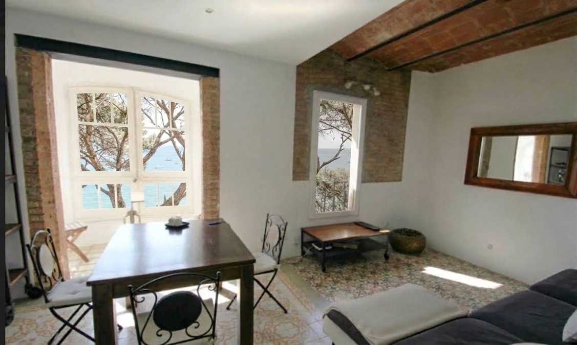 Apartament encantador a la Barceloneta amb vistes al Port Vell, llum natural i galeria oberta