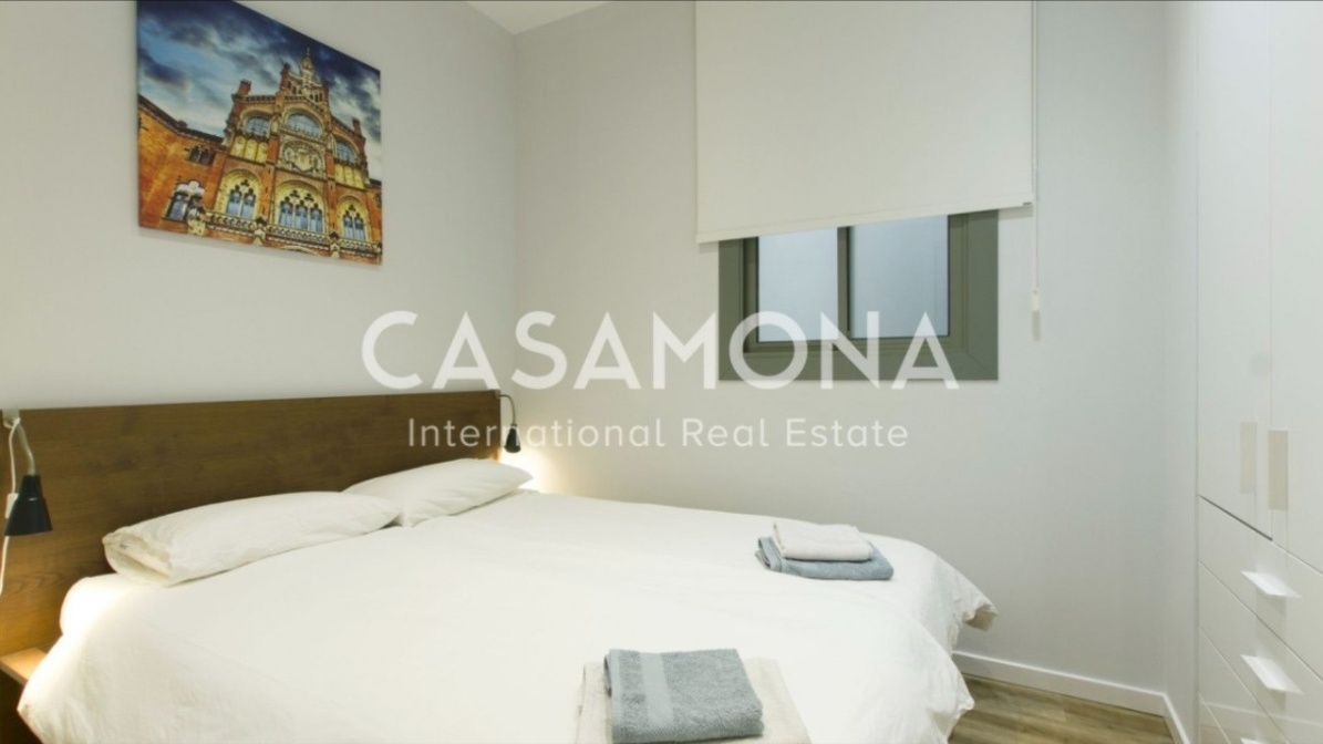 (SOLD) Modern 2 Bedroom Flat Next to Arc de Triomf with Touristic Licence - Investment Opportunity