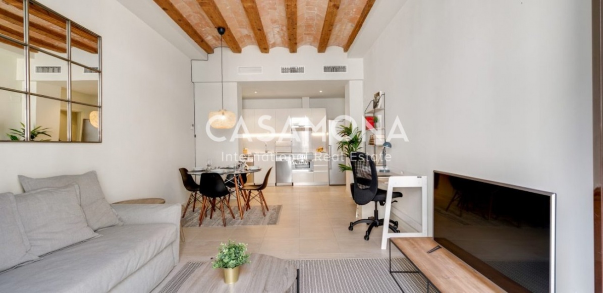 Moderne 1-Zimmer-Wohnung mit Balkon und Terrasse in einem renovierten Gebäude