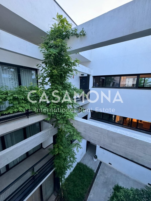 Modern Brutalist Loft with Private Terrace and Community Pool in Poblenou