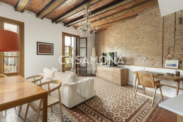 Elegante Vivienda Reformada en el Eixample con Detalles Tradicionales y Confort Moderno Elegante Vivienda Reformada en el Eixample con Detalles Tradicionales y Confort Moderno