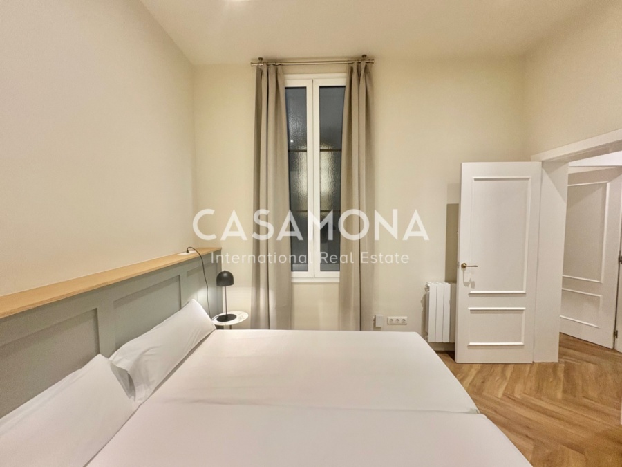 Appartement de Trois Chambres Entièrement Rénové à Port Vell Alliant Charme Historique et Élégance Moderne