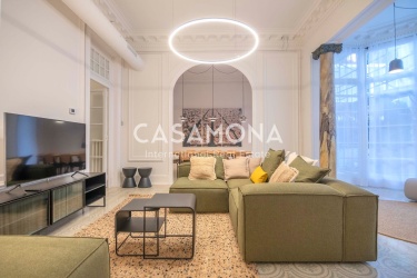 Exclusive 4-Bedroom Apartment with Historic Catalan Features in Central Eixample