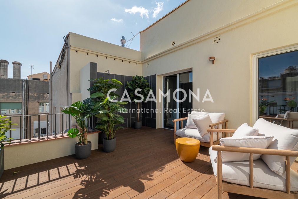 Exceptional 4-Bedroom Luxury Residence with Terrace on Calle Muntaner Exceptional 4-Bedroom Luxury Residence with Terrace on Calle Muntaner