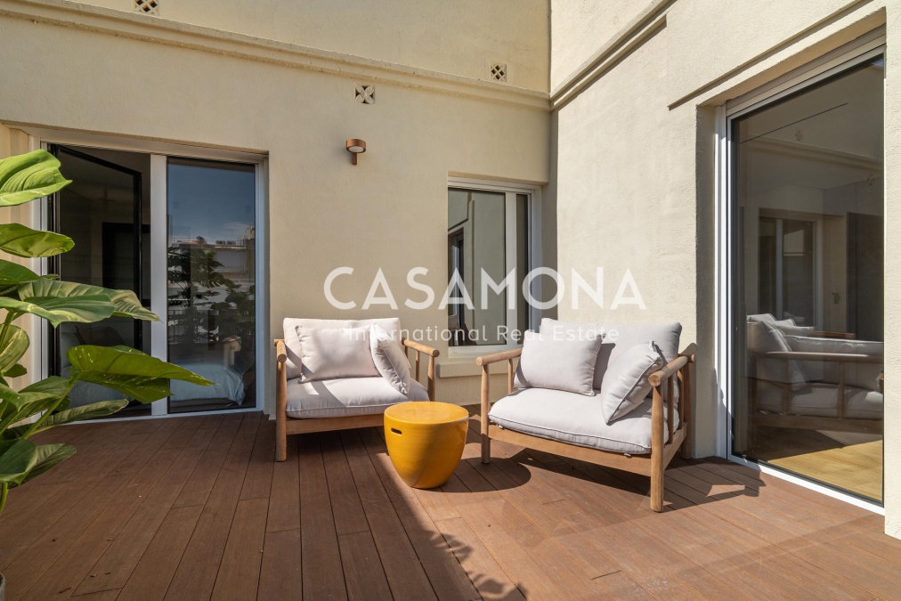 Exceptional 4-Bedroom Luxury Residence with Terrace on Calle Muntaner Exceptional 4-Bedroom Luxury Residence with Terrace on Calle Muntaner