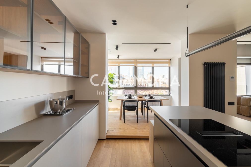 Exceptional 4-Bedroom Luxury Residence with Terrace on Calle Muntaner Exceptional 4-Bedroom Luxury Residence with Terrace on Calle Muntaner