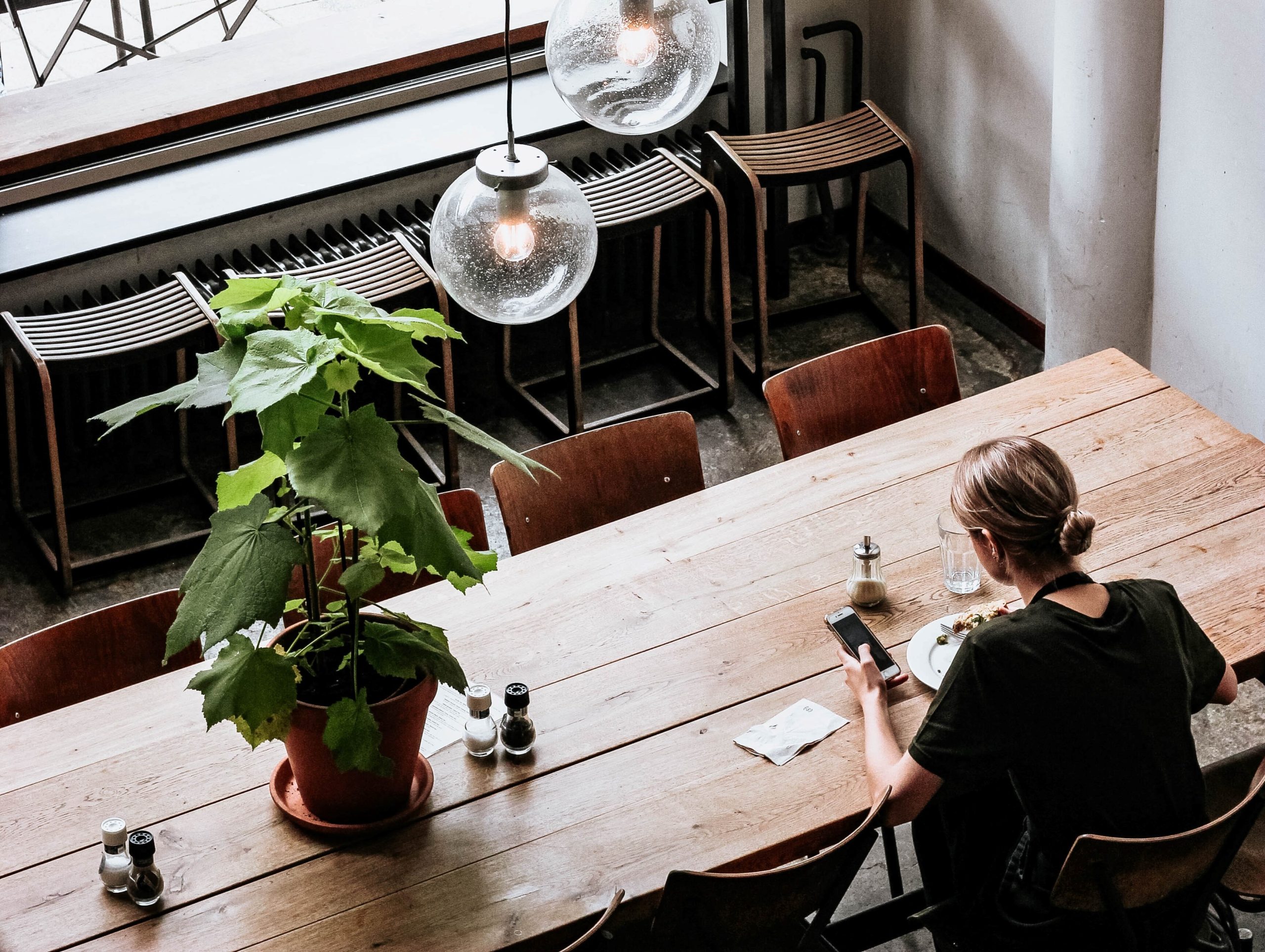 Woman working in coffee house